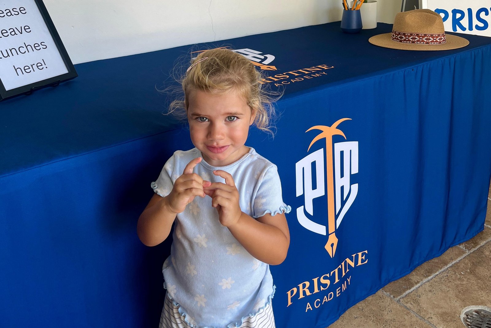 Child at Pristine Academy in Próspera